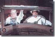 Men in old car